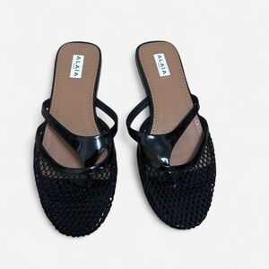 Luxury Alaia fishnet sandal